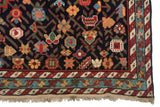 Intricate border with bird motifs and original fringe on an antique Karabagh collector rug.