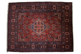 Vintage Persian Joshegan carpet, central diamond medallion, red and blue floral patterns, 10'10