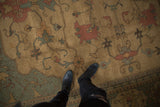 Sprawling Serapi inspired design with terracotta and slate gray blossoms on an Indian Soumac rug.