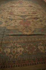 Indian Soumac carpet border featuring geometric patterns in slate gray and terracotta.