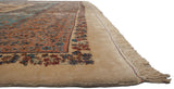 The full pile height and intact original side cord selvage of a vintage Kerman carpet.