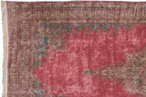 Vintage Kerman carpet corner with slate blue spandrels and an intricate Millefleur border design.