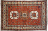 Vintage Meshkin carpet, triple geometric medallions, playful animal motifs on a terracotta field.