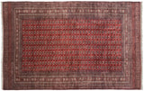 Vintage Pakistani Bokhara carpet with repeating gul medallions on a red field and a dark border, 16'5