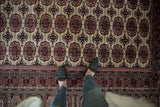 Looking down on the soft, full pile of a vintage Pakistani Bokhara carpet.