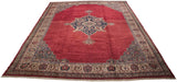 Full perspective view of a vintage Oushak carpet showing its sprawling red field and navy medallion.
