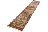 Angled view down the long vintage Kerman runner with repeating floral medallions on an ivory ground.