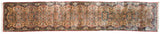 The flowing length of a vintage Kerman runner with repeating shadow medallions and floral sprays.