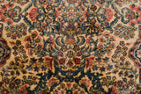 Plush, full pile of a vintage Kerman rug with dense floral sprays and shadow medallions.