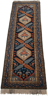 Vintage Ardebil runner corner, featuring light fringe, geometric borders, and navy ground with perched birds.
