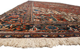 Classic Samovar reciprocating border and full wool pile on a vintage Persian Mehrivan carpet.
