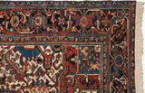 The classic Samovar border, intact side cord, and ivory fringe on a vintage Mehrivan carpet.