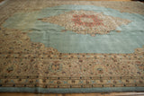 Corner spandrel detail and abrashed power blue field of a hand-knotted vintage Tabriz rug.