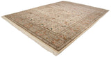 Vintage Tabriz carpet from a corner angle, showing the detailed hunting scene and full, plush pile.