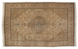 Vintage Tabriz carpet with a scalloped medallion and a floral tree design in ivory, beige, and soft powder blue.
