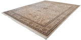 A vintage Tabriz carpet shown at an angle, displaying its central medallion and intricate pictorial field.