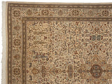 Intricate floral borders and pictorial animal motifs on the corner of a vintage Persian Tabriz carpet.