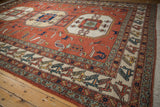 Vintage Persian Meshkin rug corner, repeating finned bird border on ivory, with fringe.