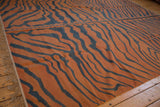Natural fringe and pale rust, charcoal tiger stripes on vintage Indian Kilim rug.