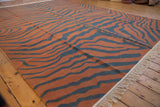 Vintage Indian Kilim with pale rust and charcoal tiger stripes, abrashes, and fringe.