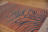 Vintage Indian Tiger Kilim rug detail, showing pale rust and dusty charcoal stripes with abrashes.