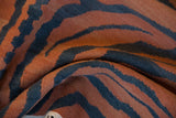 Vintage Indian Tiger Kilim rug texture, highlighting pale rust and charcoal abrashes.