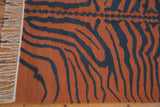 Pale rust and dusty charcoal tiger stripe pattern on vintage Indian Kilim rug with fringe.
