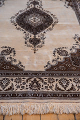 Unique rainbow-colored rows accent the fringed end of this vintage wool Tabriz carpet.