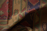 Vintage hand-woven Dhurrie carpet with geometric olive, raspberry, and navy flatweave texture.