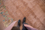 A perspective view highlighting the super soft and plush feel of the vintage dusty rose carpet.