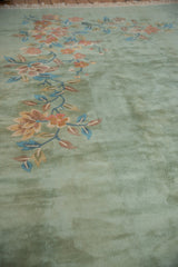 Plush pile showing ornate Japanese Art Deco foliage in pale green, blush, and blue tones.