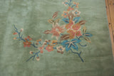 Japanese Art Deco Design Carpet detail with plush pile, ornate floral foliage in blush, blue, and ocean green.