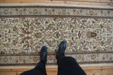 Plush pile and intricate forest scene design of a vintage hand knotted Persian Tabriz runner.
