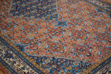 Vintage Ardebil carpet corner with fine Herati motif and inverted rust and sapphire blue ground.