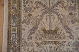 Pictorial Tabriz rug runner depicting birds, tree, and soft blush vinery.