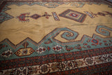 Deep ocean green mountainous overlay, geometric plant motifs, and rust-toned border.