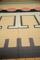 Vintage Indian Contemporary Kilim rug's interlocked geometric design in beige and black.