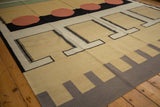 Contemporary Indian Kilim detail with interlocked beige shapes, black dashes, reddish circle, and grey border.