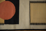 Corner of Vintage Indian Contemporary Kilim rug with beige, sand, and black interlocked pattern.