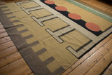 Corner view of vintage Indian Kilim with geometric sand and coffee block pattern.