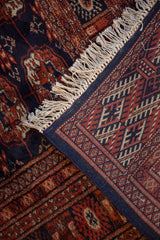 Fine back weave, plush wool pile, and intact side cord on a vintage Bokhara rug.