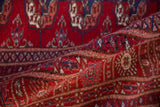 The high sheen and plush, silk-like pile of a vintage Pakistani Bokhara rug.