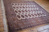 A full perspective of the fine Bokhara design carpet showing its intricate gul medallions.