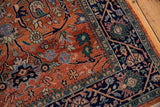 Rust gul ferang rose florals meeting navy meandering vine border, with mallard green and powder blue accents.