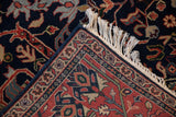Vintage Indian Bijar rug corner with cream fringe and deep brick red vine border.