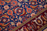 Finely detailed samovar turtle border beside the large-scale Herati motif on an indigo blue field.
