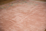 The plush, even pile and super soft, blankety texture of a vintage dusty rose carpet.