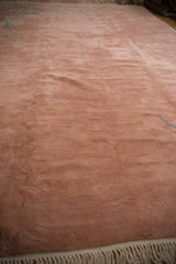 Soft, blankety texture and full, even pile of the vintage dusty rose carpet.