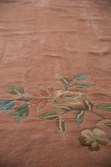 Plush, even pile of a Japanese Art Deco carpet showing details of ornate foliage.