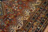 Hand knotted Indian Shiraz design featuring dense field and border motifs in chestnut, navy, gold, beige.